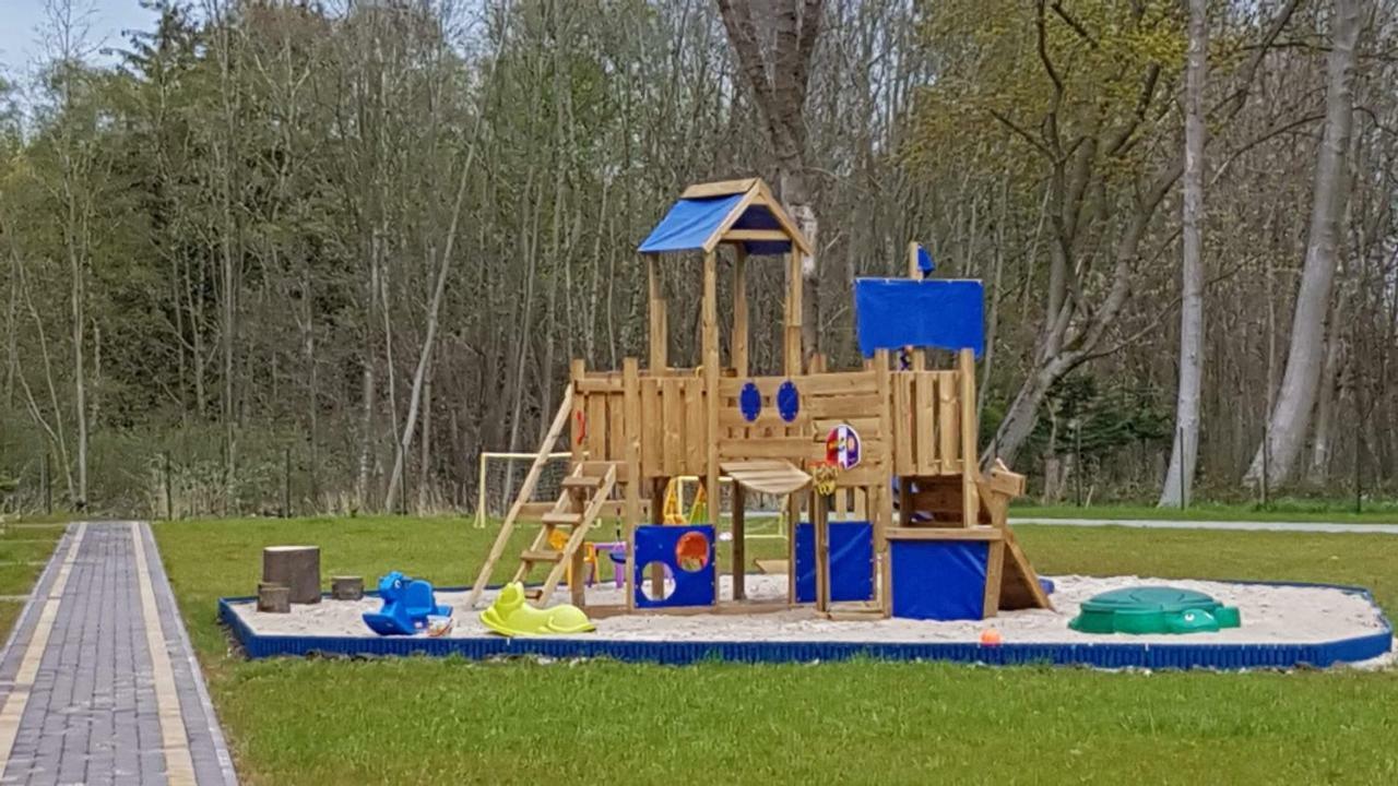 Domki Przy Plazy Owocowy Ogrod Rewal Exterior foto